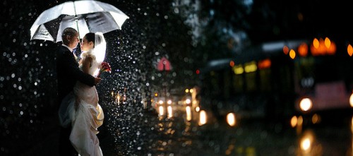 Bride and Groom in the rain